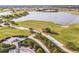 Golf course with water features and cart paths at 4534 Trento Pl, Bradenton, FL 34211