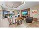 Spacious living room with large sectional sofa and flat-screen TV at 4534 Trento Pl, Bradenton, FL 34211