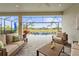 Covered patio with comfortable seating overlooking the pool at 4534 Trento Pl, Bradenton, FL 34211
