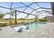 Relaxing pool and spa with covered lanai and water features at 4534 Trento Pl, Bradenton, FL 34211