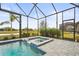 Spa and pool area with a covered lanai, offering a relaxing outdoor oasis at 4534 Trento Pl, Bradenton, FL 34211