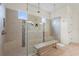Large walk-in shower with built-in bench and glass enclosure at 4534 Trento Pl, Bradenton, FL 34211