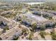 Aerial view of community showing building layout and lake at 4802 51St W St # 1304, Bradenton, FL 34210