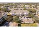Aerial view of community with building, parking and pond at 4802 51St W St # 1304, Bradenton, FL 34210