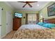 Main bedroom with a king-size bed and calming decor at 4802 51St W St # 1304, Bradenton, FL 34210