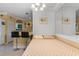 Condo bedroom with a comfortable bed and built-in shelving at 4802 51St W St # 1304, Bradenton, FL 34210