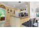 Well-equipped kitchen with granite counters and white cabinets at 4802 51St W St # 1304, Bradenton, FL 34210