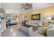 Open living space with couch, coffee table, and bedroom view at 4802 51St W St # 1304, Bradenton, FL 34210
