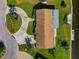 Top-down view of home showcasing unique circular driveway and canal-side location at 5011 Mangrove Point Rd, Bradenton, FL 34210