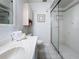 Bathroom with a walk-in shower and updated fixtures at 5011 Mangrove Point Rd, Bradenton, FL 34210