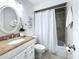 Clean bathroom with granite countertop and white cabinets at 5011 Mangrove Point Rd, Bradenton, FL 34210
