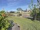 Peaceful waterfront view with lush landscaping at 5011 Mangrove Point Rd, Bradenton, FL 34210