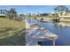 Serene canal views with a wooden dock at 5011 Mangrove Point Rd, Bradenton, FL 34210