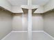 Large walk-in closet with ample shelving and hanging space at 5011 Mangrove Point Rd, Bradenton, FL 34210