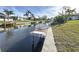 Private dock on a canal, perfect for enjoying waterfront living at 5011 Mangrove Point Rd, Bradenton, FL 34210