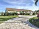Spacious driveway with a paver design at 5011 Mangrove Point Rd, Bradenton, FL 34210
