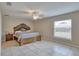 Main bedroom with king-size bed, and a large window at 5371 Fleming St, Port Charlotte, FL 33981