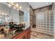 Spa-like bathroom with double vanity and walk-in shower at 5376 Shadow Lawn Dr, Sarasota, FL 34242