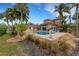 Inviting pool area with lounge chairs and landscaping at 5376 Shadow Lawn Dr, Sarasota, FL 34242