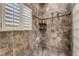 Large walk-in shower with multiple shower heads at 5376 Shadow Lawn Dr, Sarasota, FL 34242