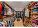 Large walk-in closet with ample shelving and hanging space at 5376 Shadow Lawn Dr, Sarasota, FL 34242