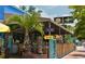 Outdoor Tiki Bar with seating, offering coffee, espresso, and cocktails at 5402 Shadow Lawn Dr, Sarasota, FL 34242