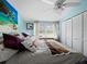 Cozy bedroom with a comfortable bed and large closet at 5645 Churchill Downs Rd, Sarasota, FL 34241