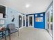 Dog grooming salon's entrance with two access doors at 5645 Churchill Downs Rd, Sarasota, FL 34241