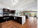Modern kitchen featuring stainless steel appliances and an island at 5645 Churchill Downs Rd, Sarasota, FL 34241