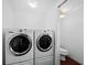 Laundry room with washer, dryer and toilet at 5645 Churchill Downs Rd, Sarasota, FL 34241