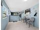 Dog grooming salon's inviting lobby with comfortable seating at 5645 Churchill Downs Rd, Sarasota, FL 34241