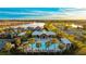 Resort-style pool, clubhouse, and tennis courts in community at 6138 162Nd E Ave, Parrish, FL 34219