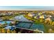 Aerial view of community with pool and sports courts at 6138 162Nd E Ave, Parrish, FL 34219