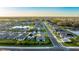 Aerial view of a residential neighborhood with houses and streets at 6138 162Nd E Ave, Parrish, FL 34219