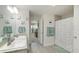Shared bathroom with dual sinks and shower/tub combo at 6138 162Nd E Ave, Parrish, FL 34219