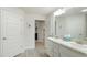 Clean bathroom with dual sinks and a view into another room at 6138 162Nd E Ave, Parrish, FL 34219