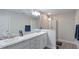 Modern bathroom with dual sinks and a large shower at 6138 162Nd E Ave, Parrish, FL 34219