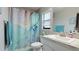 Clean bathroom with a shower/tub combo and granite countertop at 6138 162Nd E Ave, Parrish, FL 34219