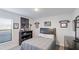 Cozy bedroom with window and a collection of mementos at 6138 162Nd E Ave, Parrish, FL 34219