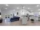 Modern kitchen with white cabinets, granite countertops, and stainless steel appliances at 6138 162Nd E Ave, Parrish, FL 34219