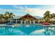 Community pool with clubhouse and lounge chairs at 6138 162Nd E Ave, Parrish, FL 34219