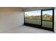 Screened porch overlooking the backyard with a view of the neighborhood at 6138 162Nd E Ave, Parrish, FL 34219