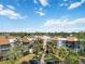 Aerial view of community with lush landscaping at 618 Bird Bay S Dr # 201, Venice, FL 34285