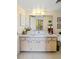 Bright bathroom with single sink vanity and a toilet at 618 Bird Bay S Dr # 201, Venice, FL 34285