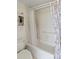 Bathroom featuring a shower/tub, and floral shower curtain at 618 Bird Bay S Dr # 201, Venice, FL 34285