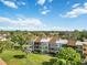 Condo building with a view of surrounding neighborhood at 618 Bird Bay S Dr # 201, Venice, FL 34285