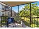Relaxing screened balcony overlooking lush landscape at 618 Bird Bay S Dr # 201, Venice, FL 34285