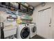 Laundry room with washer, dryer, and utility sink at 625 Ennis Nw Ter, Port Charlotte, FL 33952