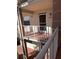 Private balcony with view of parking lot at 6505 Stone River Rd # 202, Bradenton, FL 34203