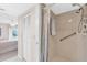 Bathroom with shower and linen closet at 6505 Stone River Rd # 202, Bradenton, FL 34203